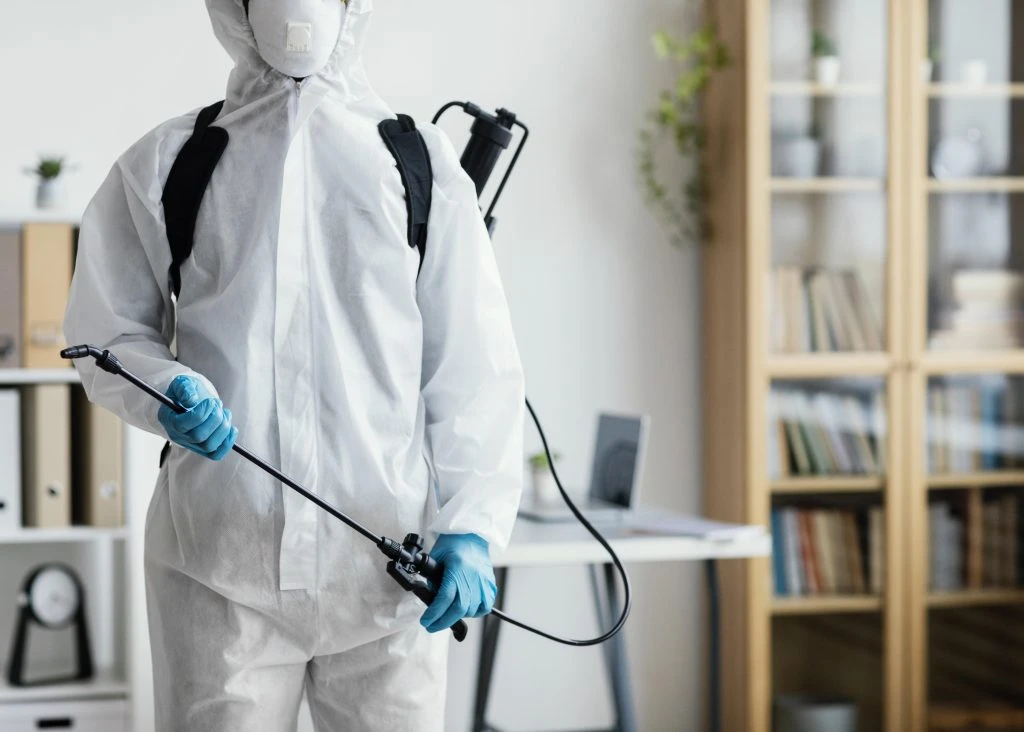 Trained PestMan technician applying treatment